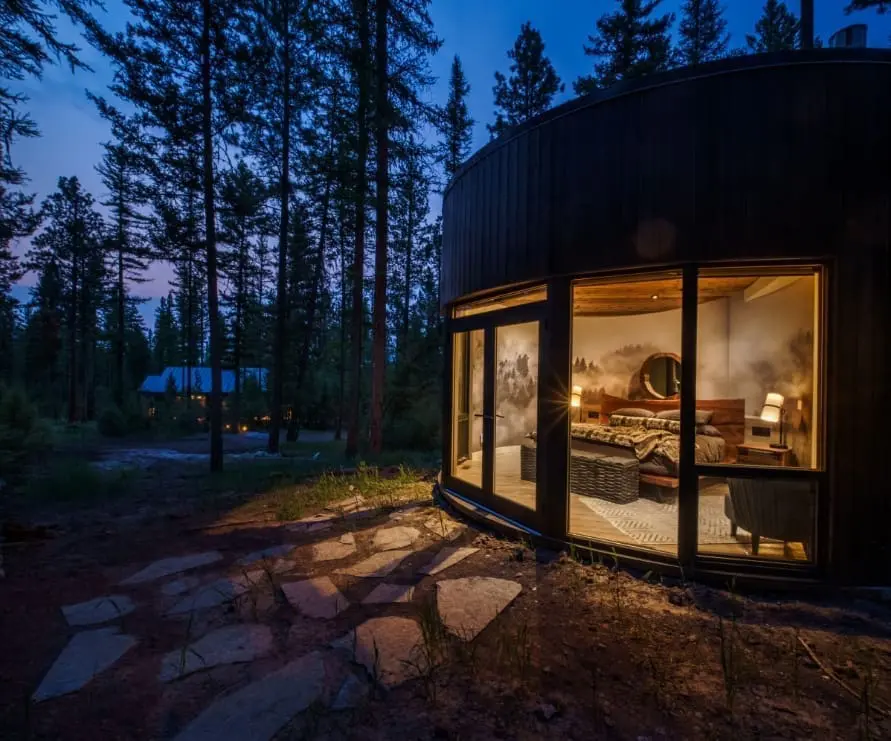 Outside view of Round Haus, showing the bedroom inside the modern curved accomodation