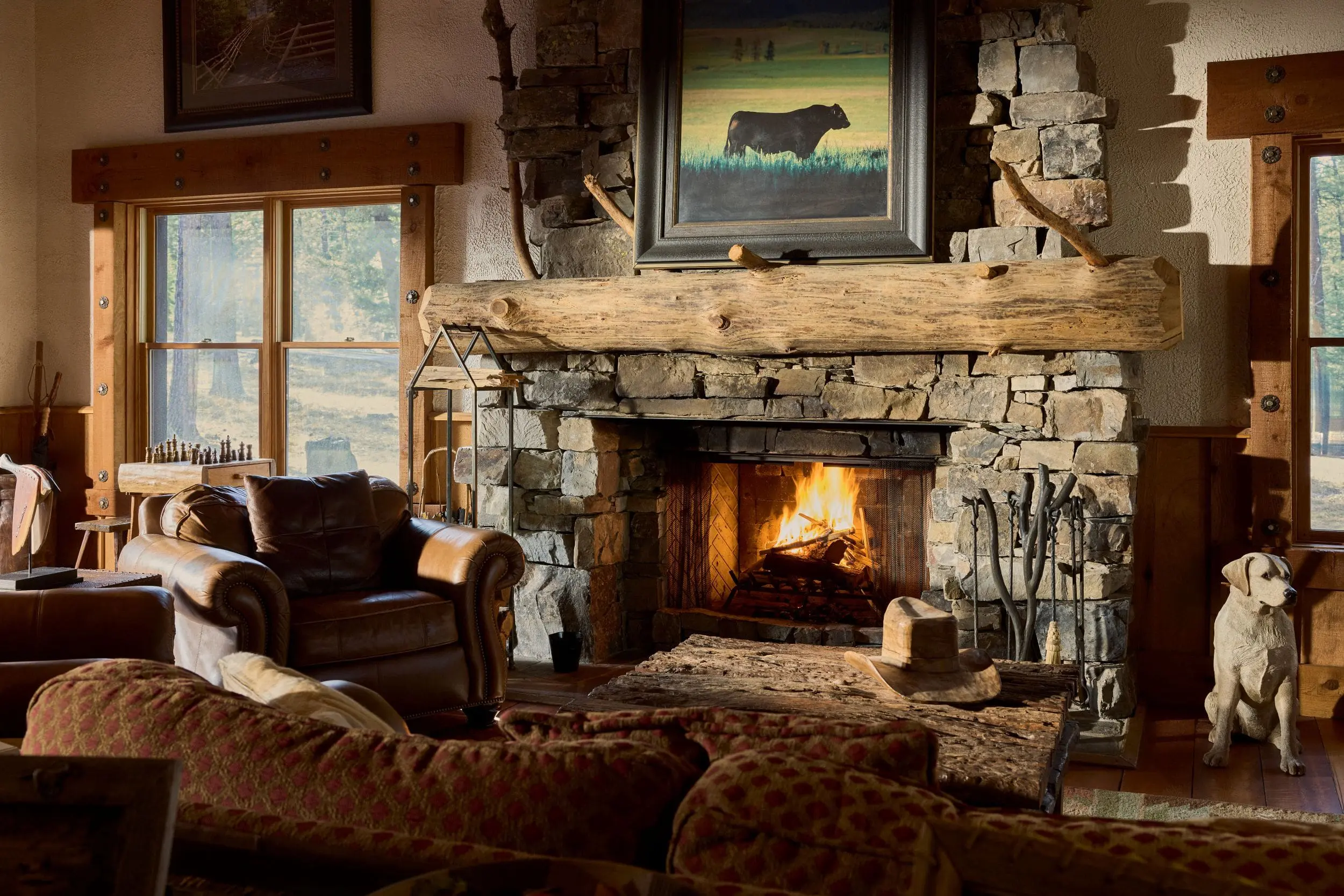 Western living room with stone fireplace