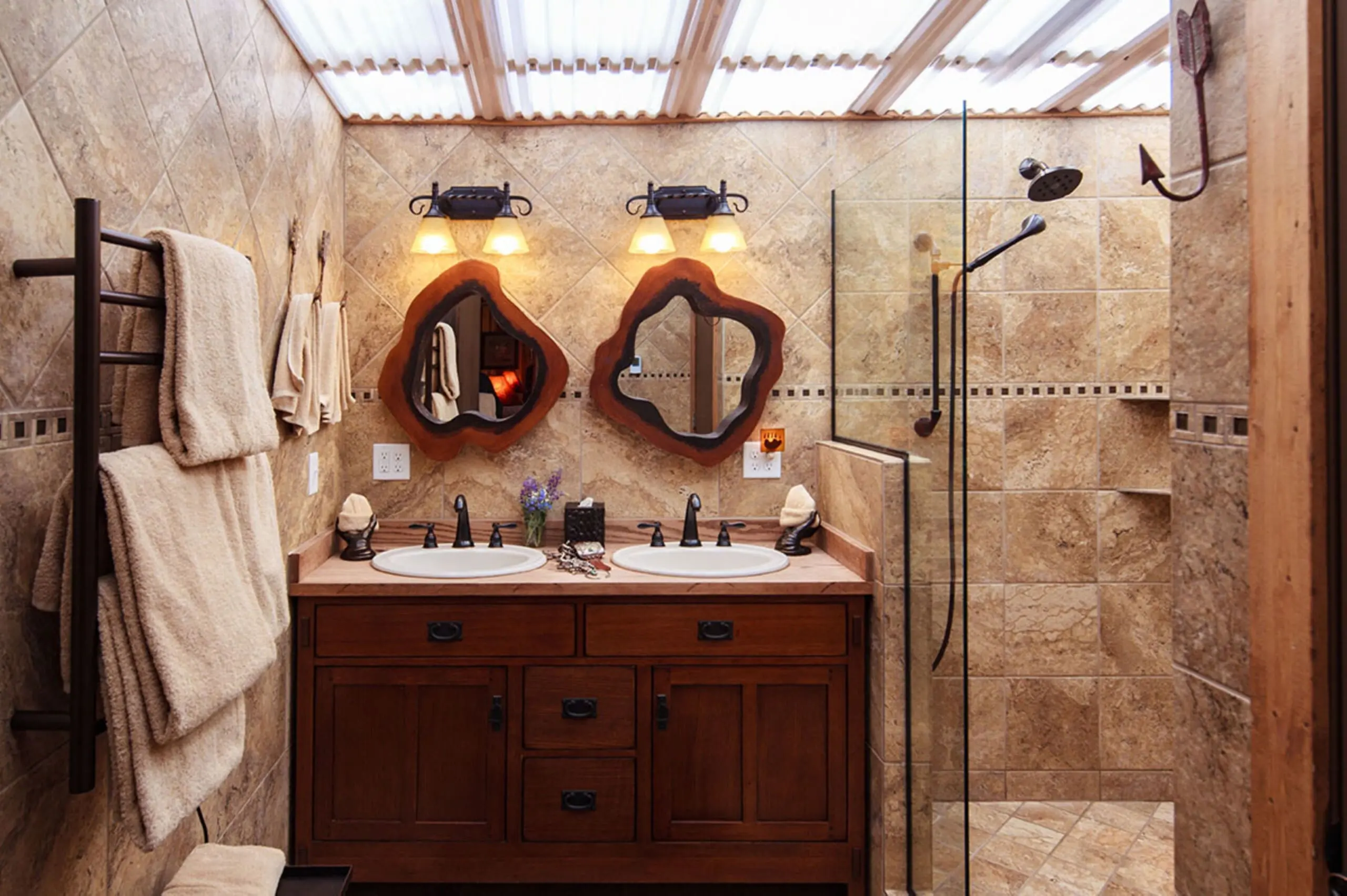 Luxury western bathroom inside glamping tent with double sink