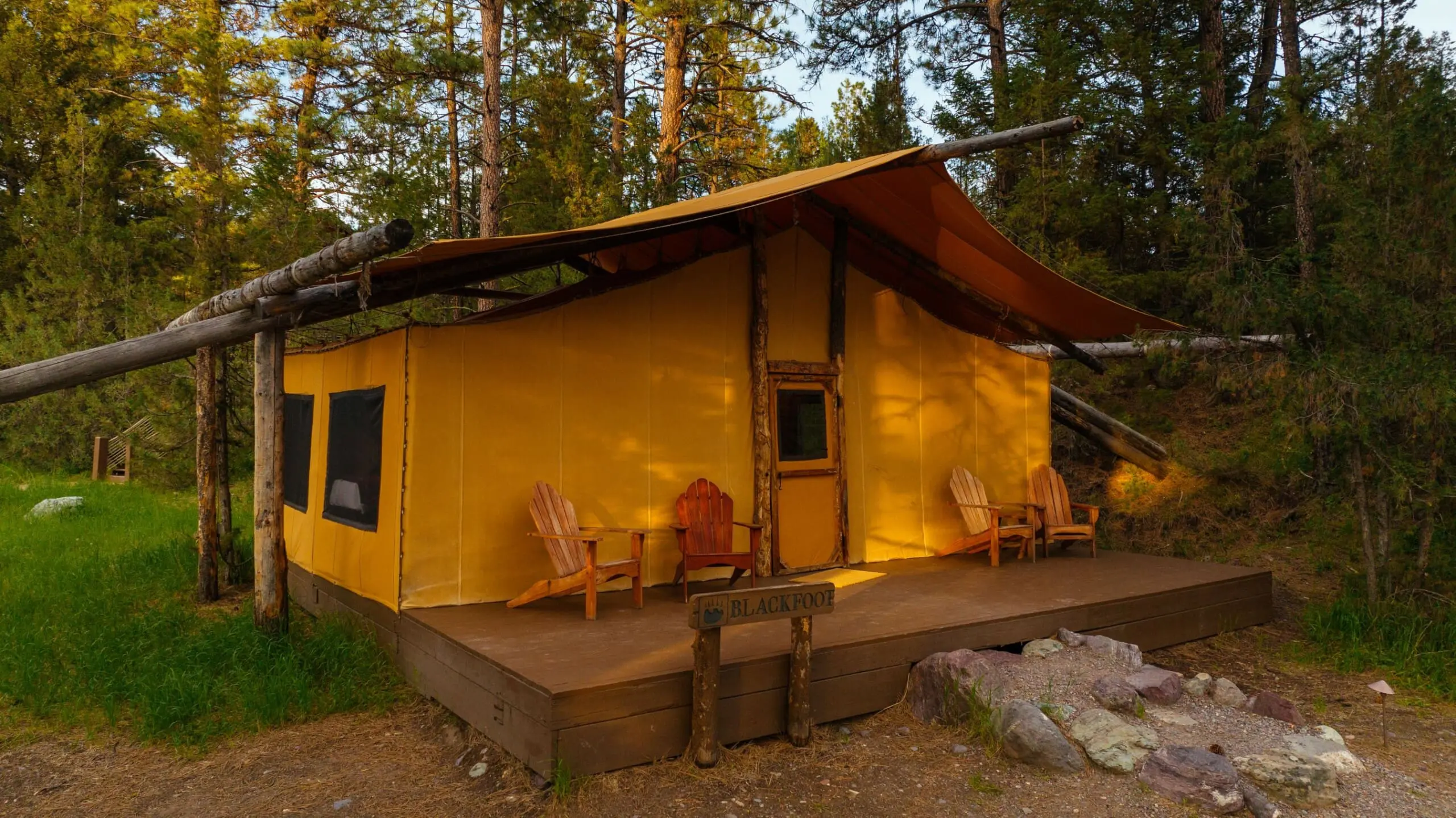 Outside of a two bedroom canvas glamping tent