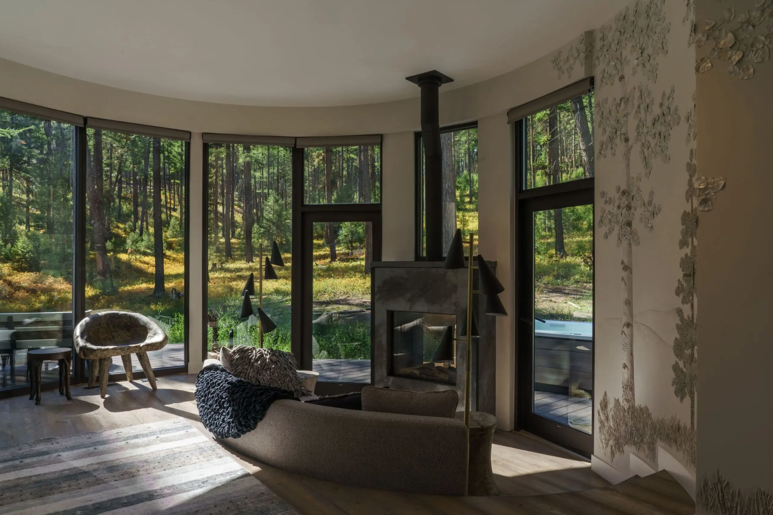 Interior of modern cabin living room with fireplace