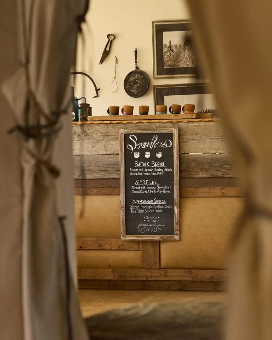 Sign inside of a western themed dining area with a coffee bar.
