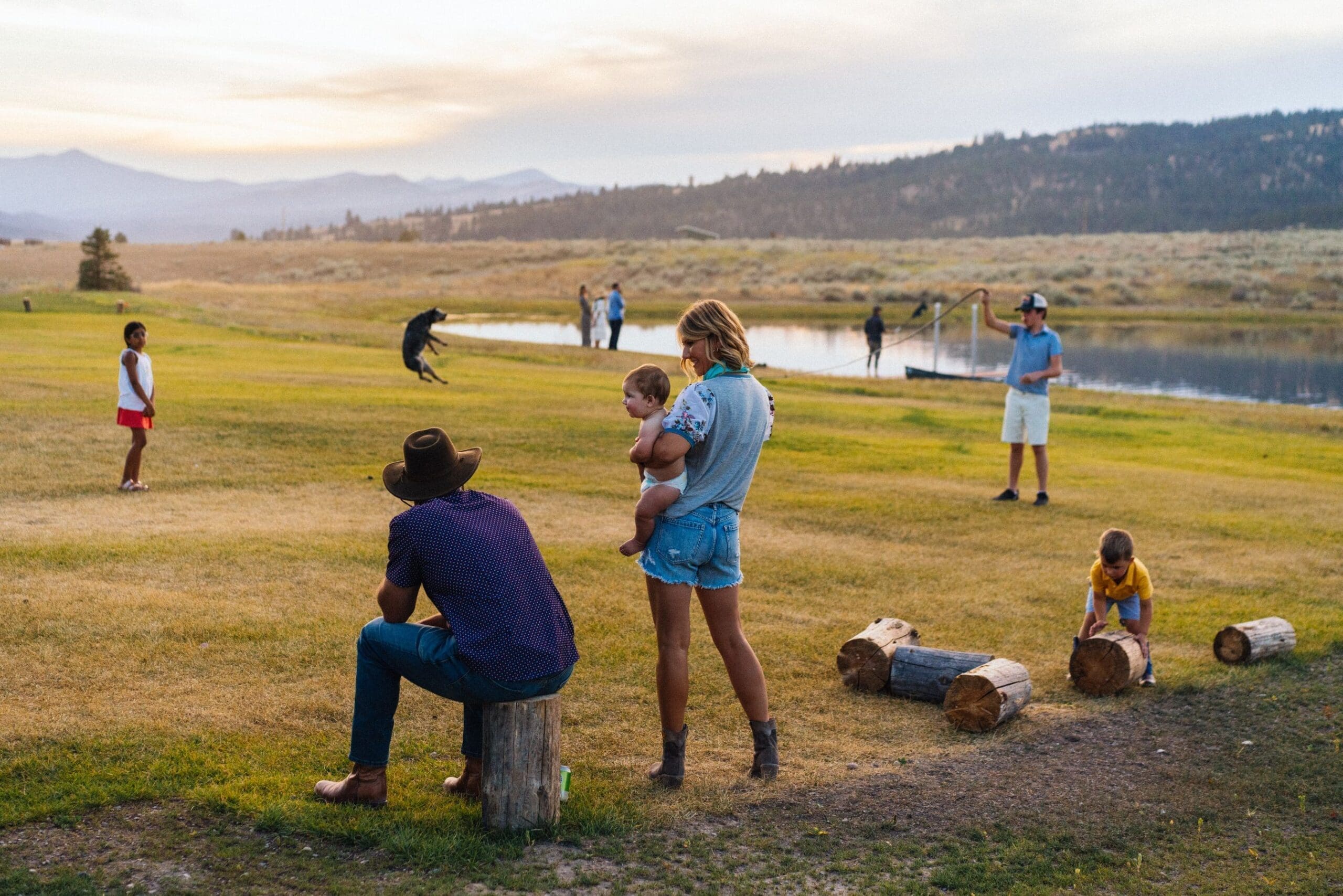 Family playing in a field