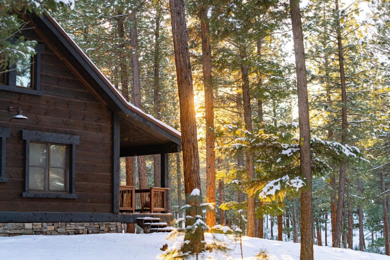 Wooden cabin in the snow-covered woods