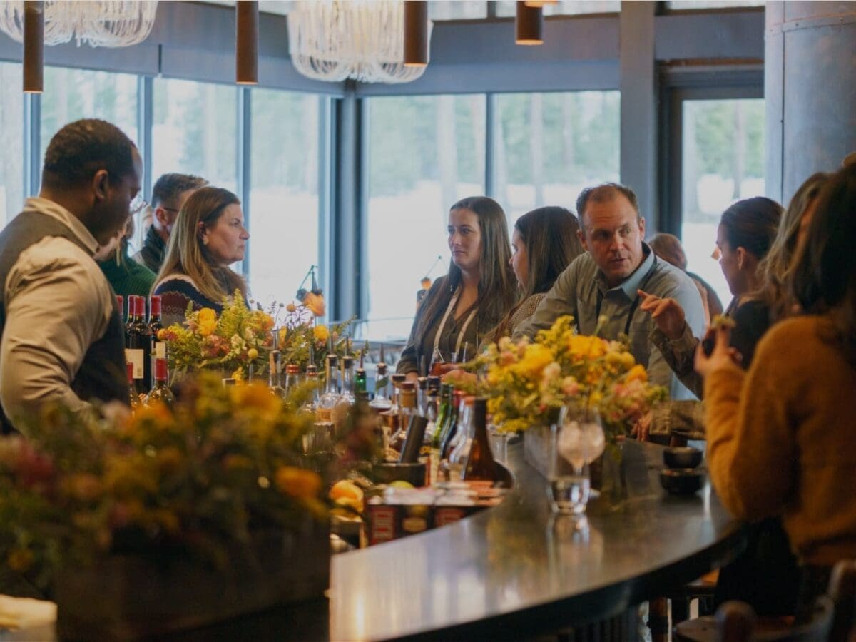 Group gathered in a Social Haus restaurant at Paws Up Montana