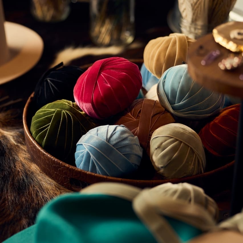 Basket of colorful velvet ribbon for hat decorating