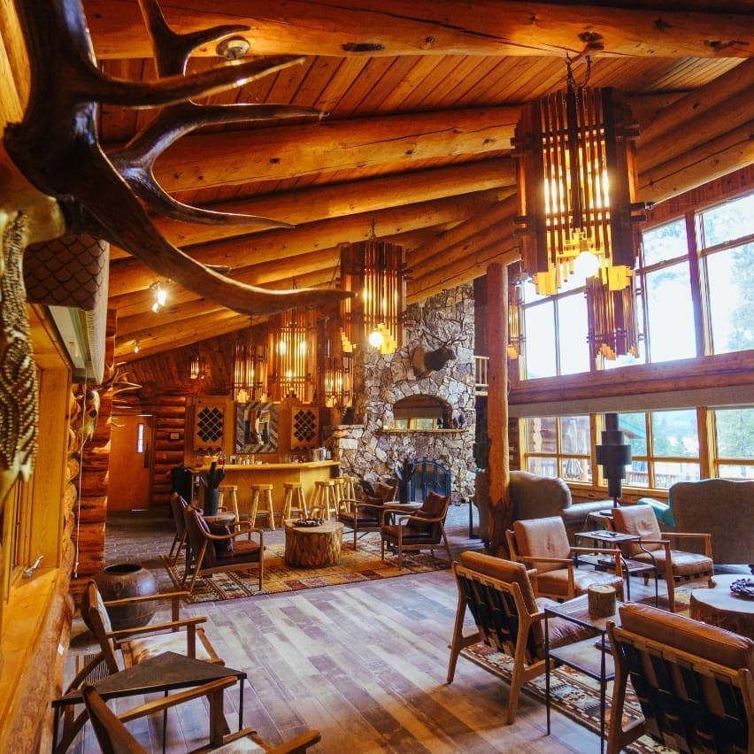Living room of a mountain-themed, western living room in a wooden cabin