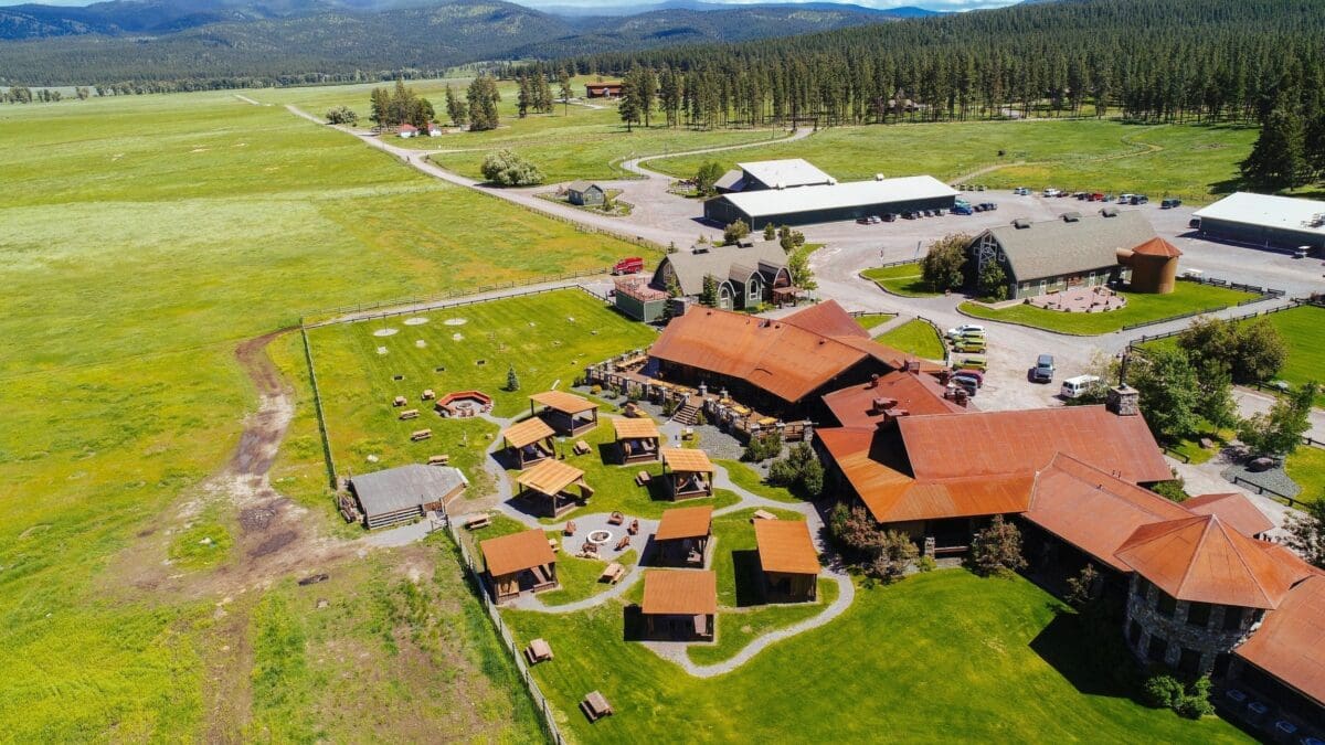 Aerial view of the Paws Up property, showing the outdoor seating area and restaurants