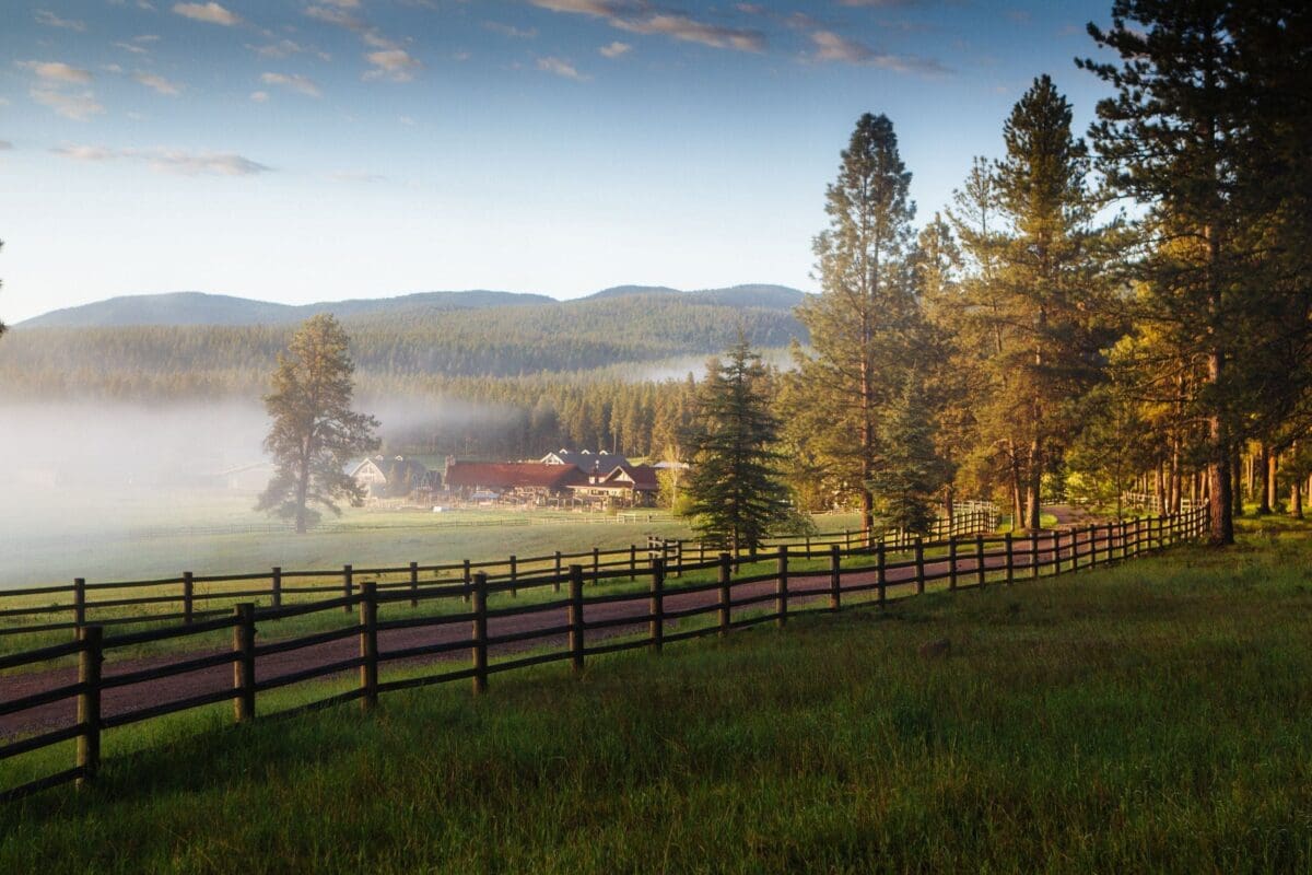 Outside view of the Paws Up Montana property from a foggy dirt road