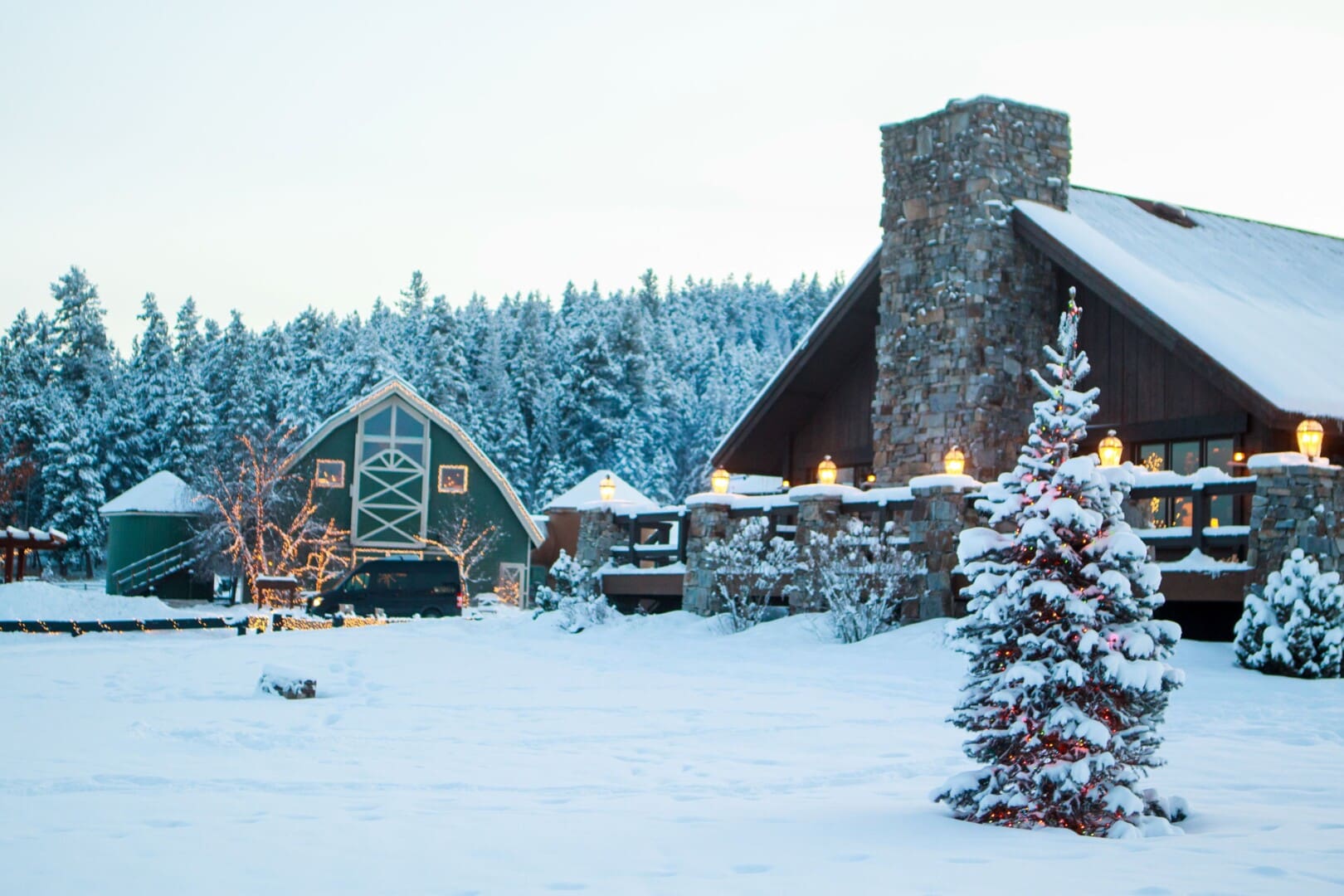 Outside of Paws Up Montana western ranch resort covered in snow