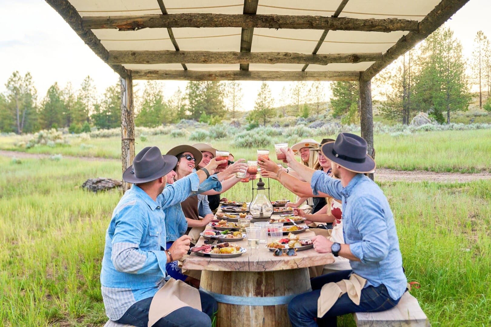 Happy group eating dinner together