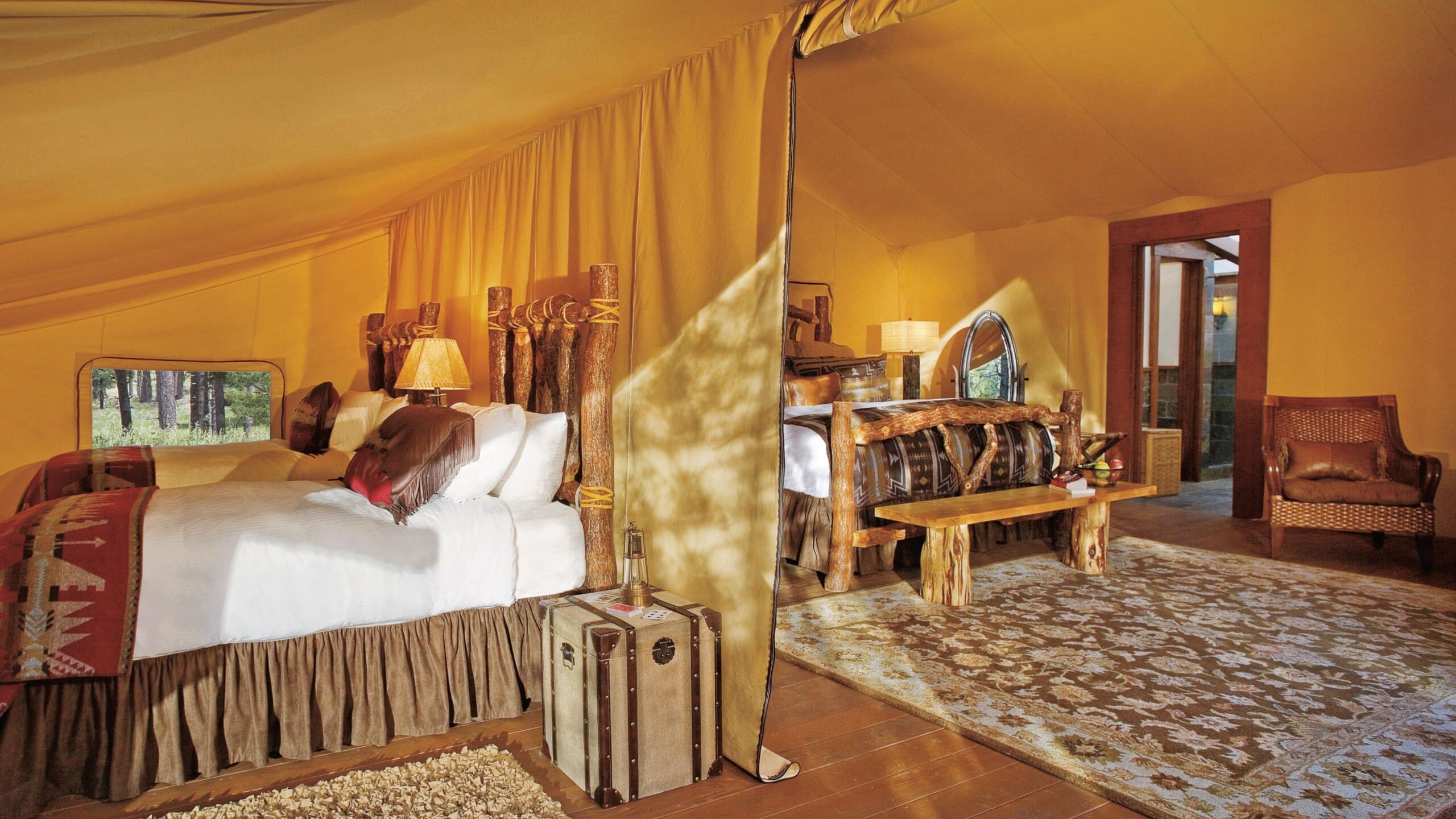 Interior of two person glamping tent with twin beds