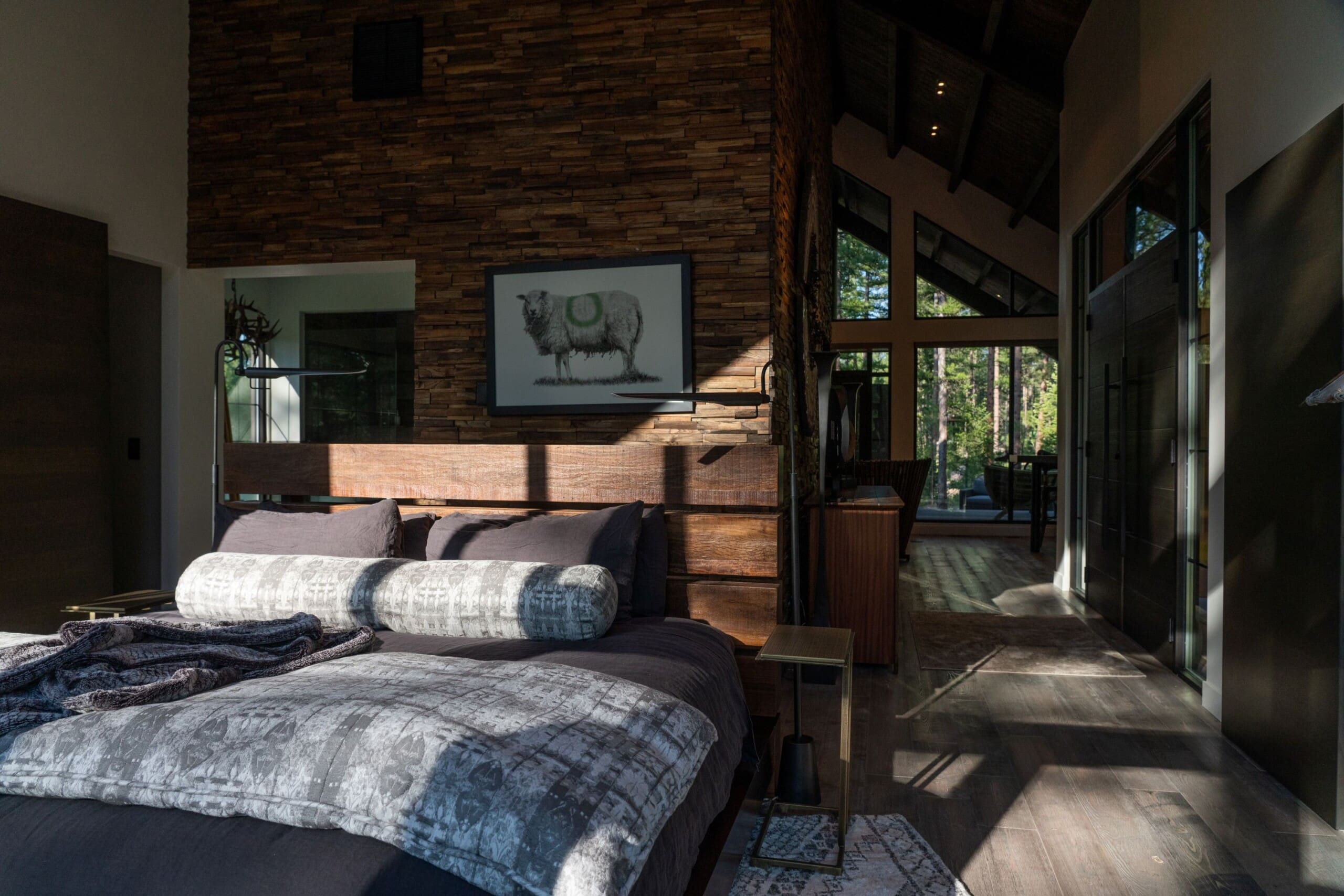 Interior of modern cabin bedroom with king size bed