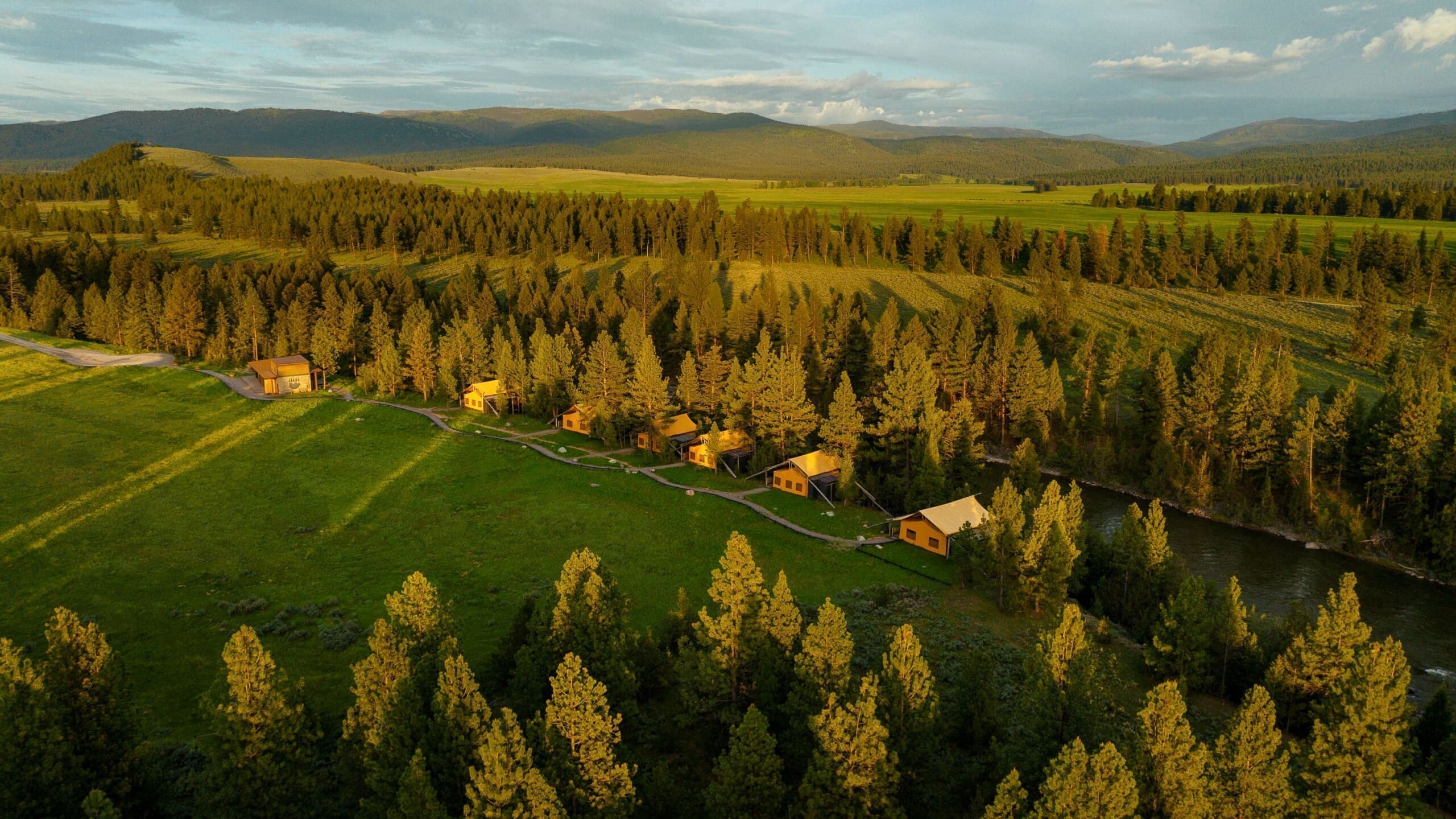 Row of canvas glamping tents