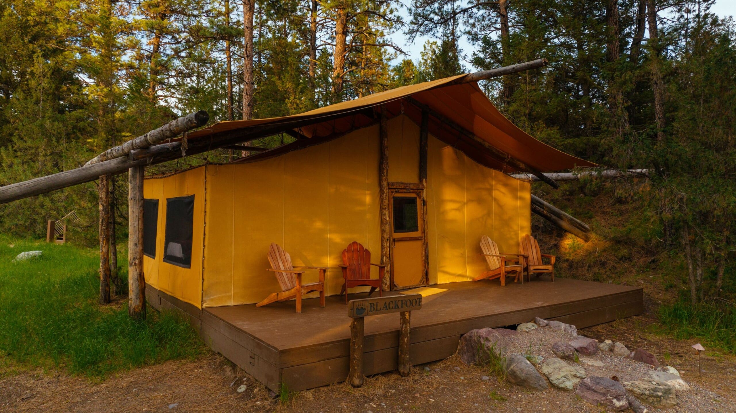 Outside of a two bedroom canvas glamping tent