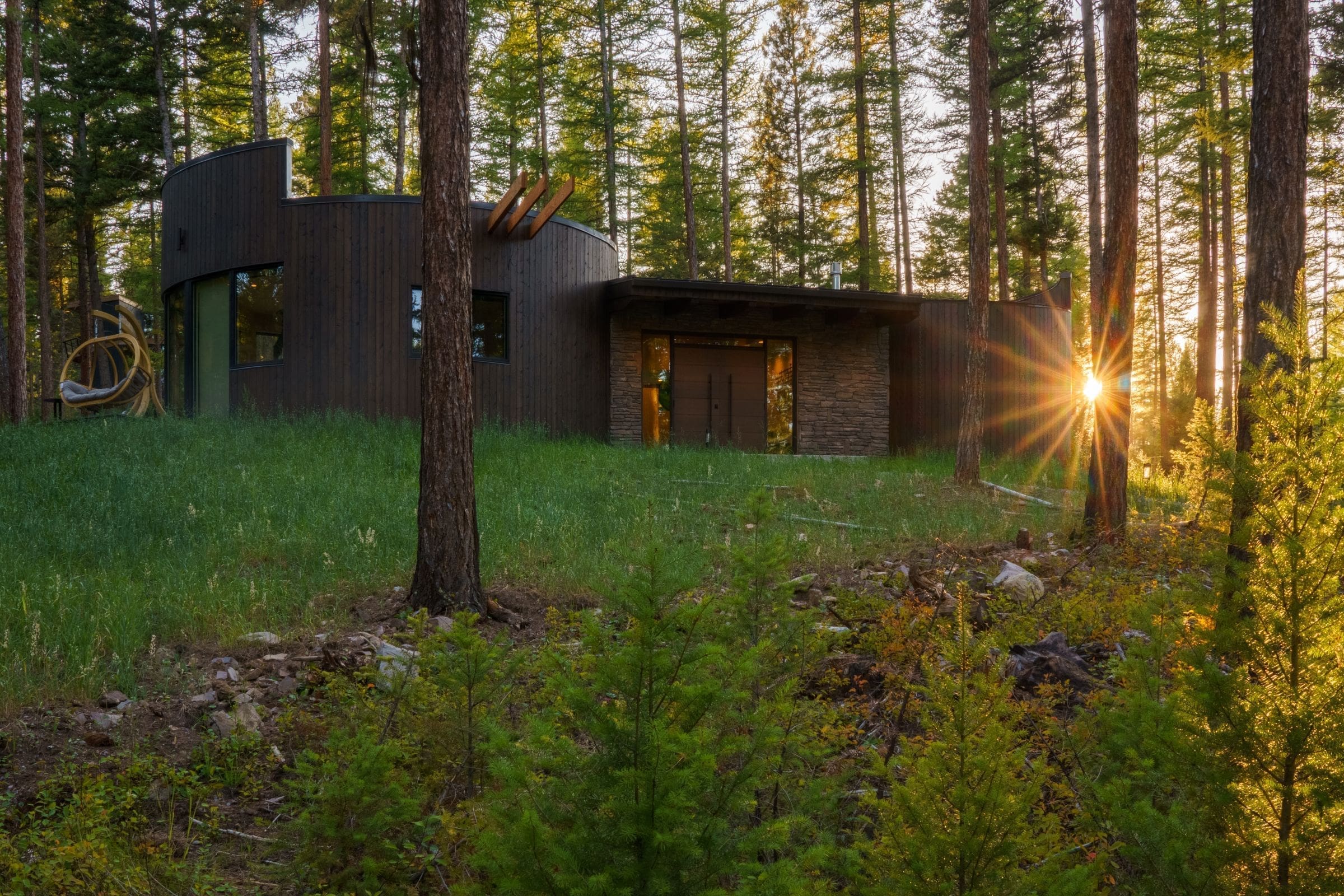 Exterior of round cabin in the woods