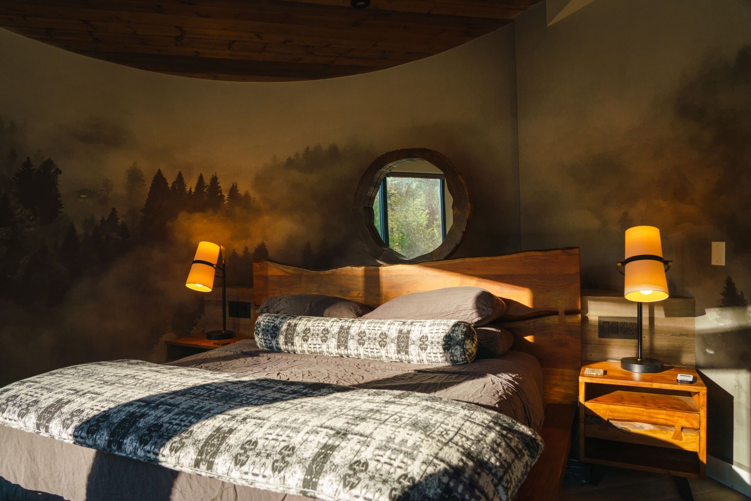 Interior of modern cabin bedroom with king size bed