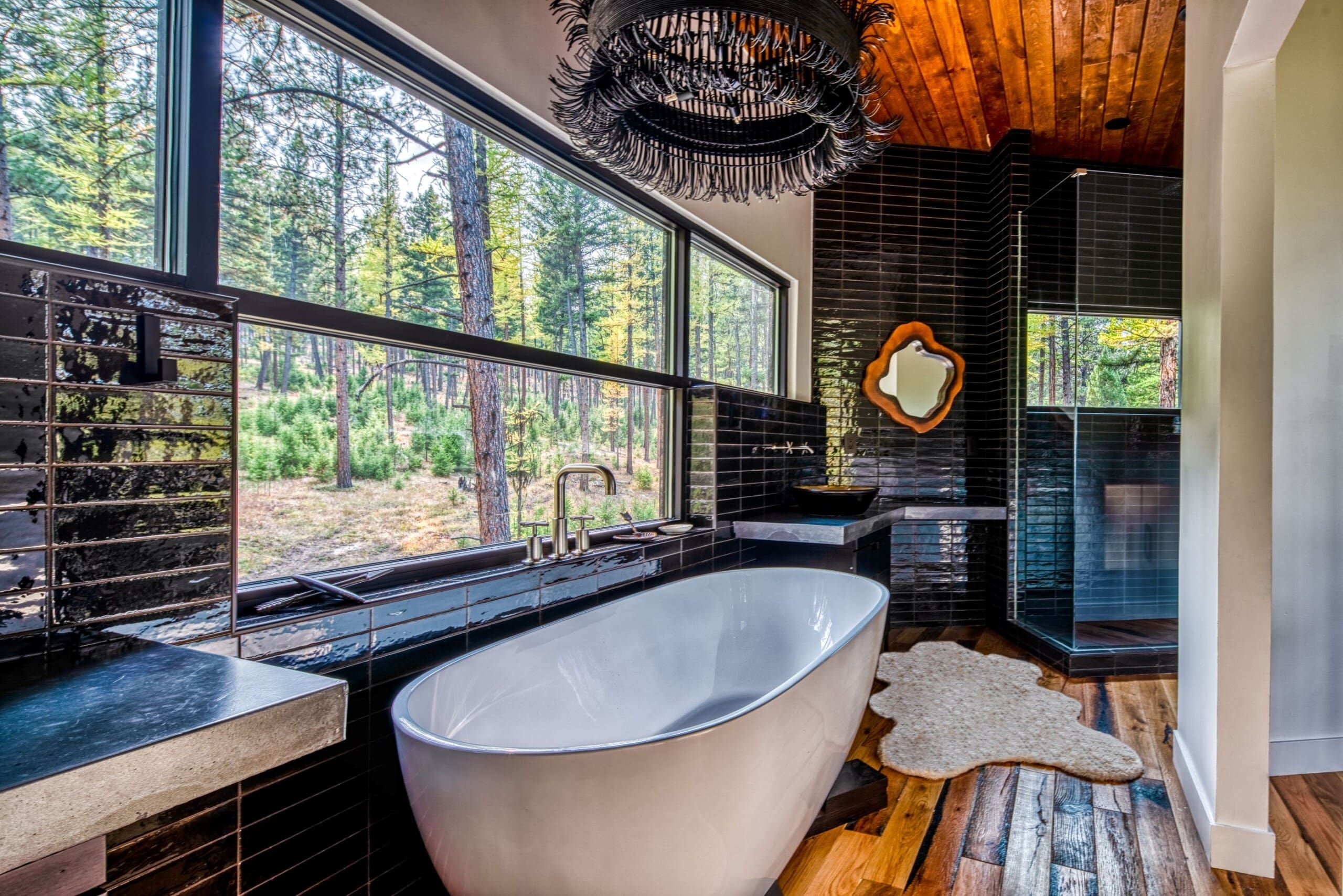 Modern interior of a treehouse cabin bathroom with bathtub