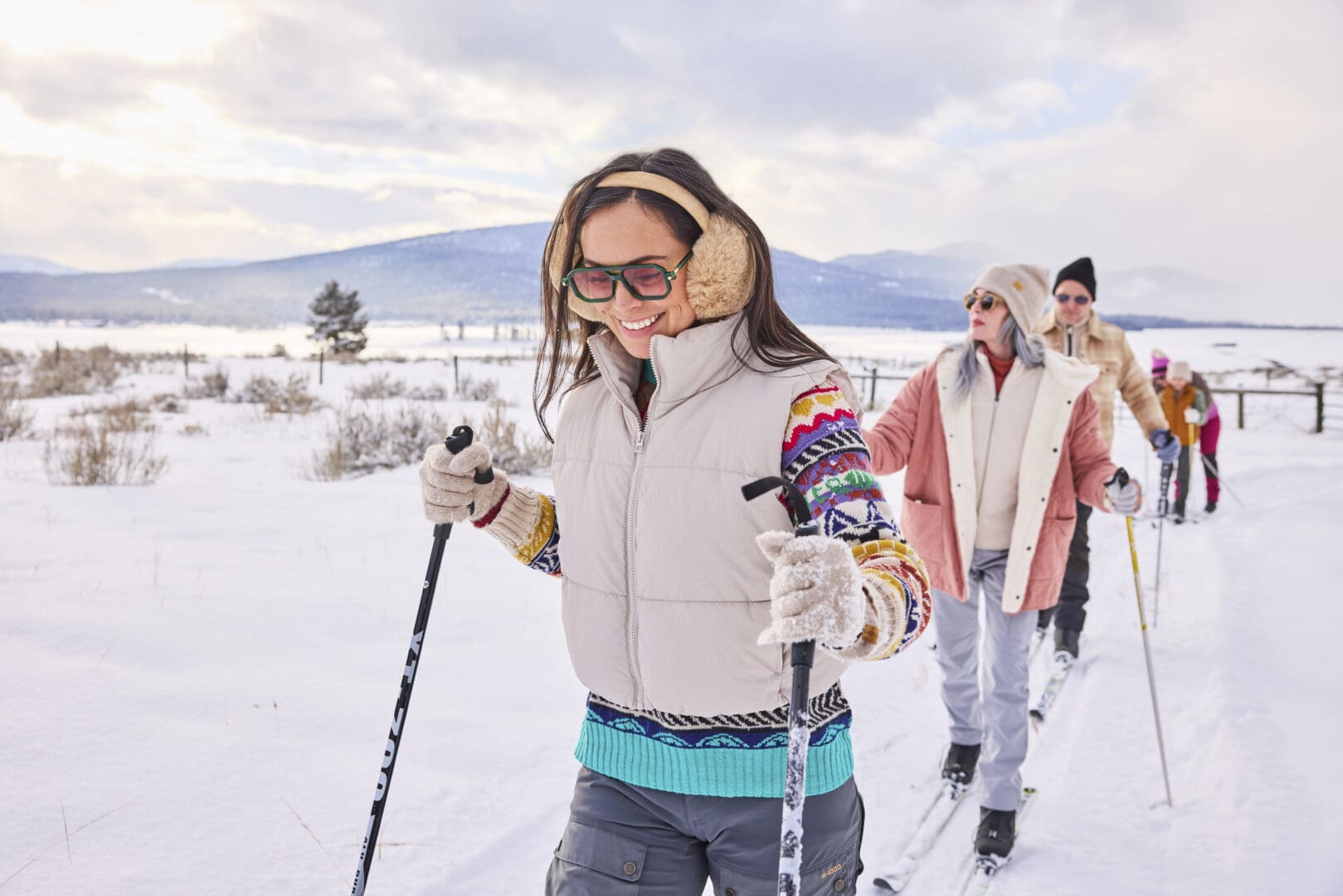 Group of guests cross-country skiing.
