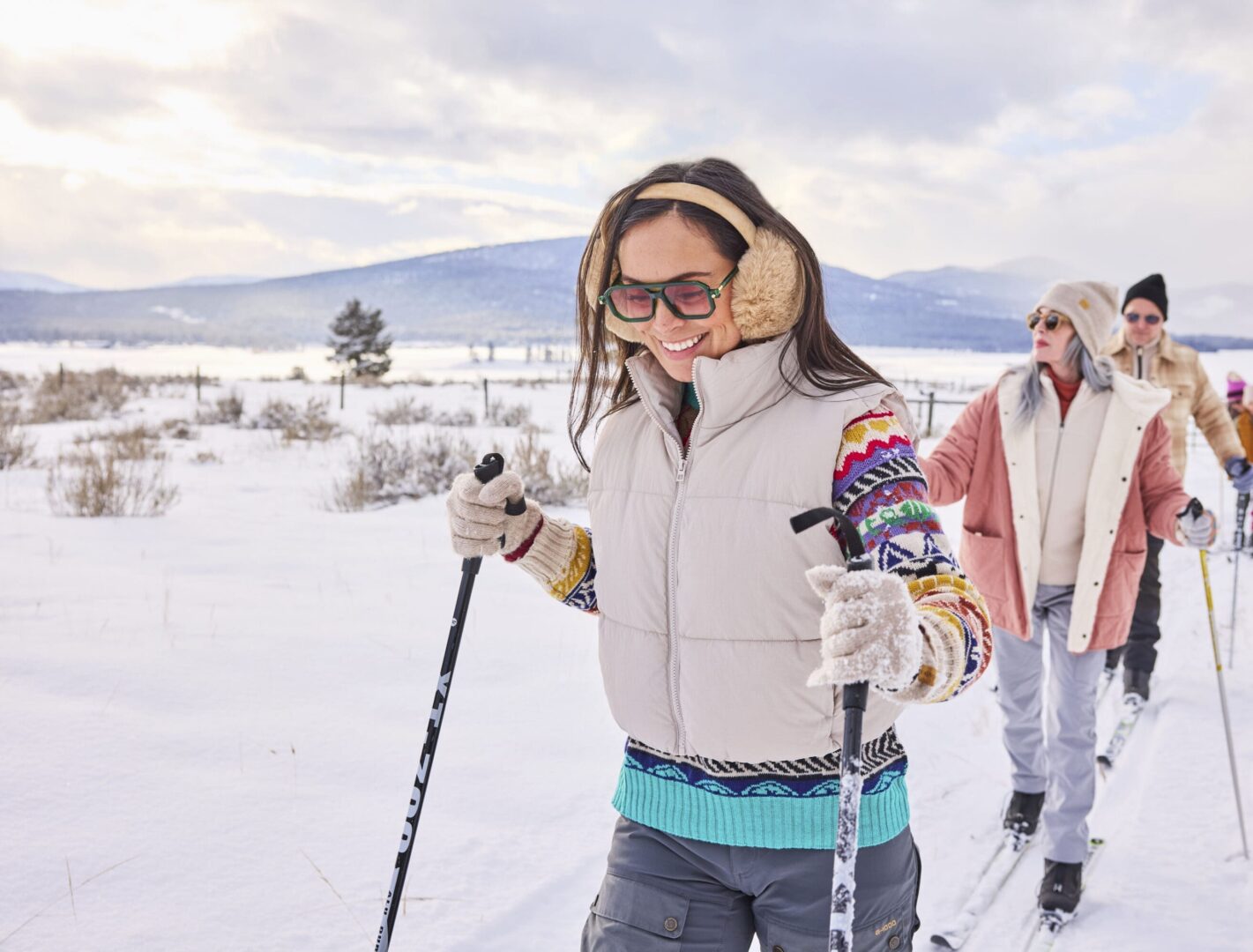Group of guests cross-country skiing.