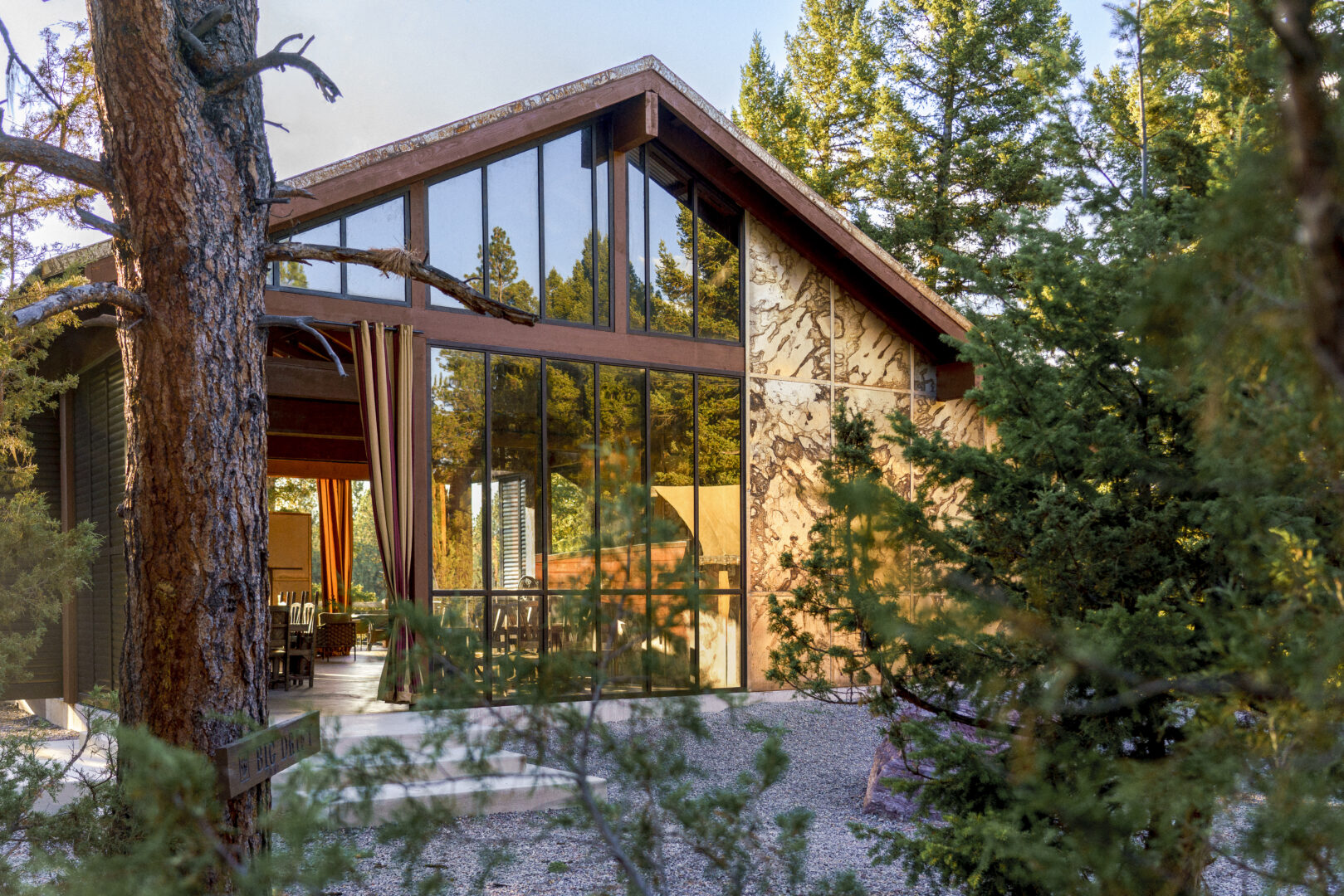 Cliffside glamping spot featuring a glass home.